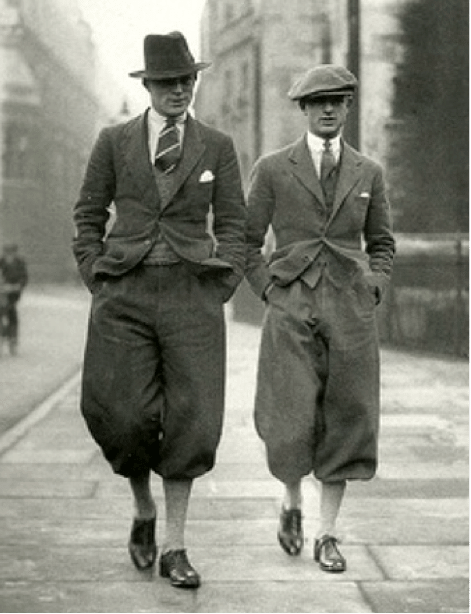 Vintage men walking down street with balloon pants.