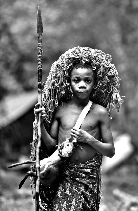 vintage african young boy with spear hunting gear