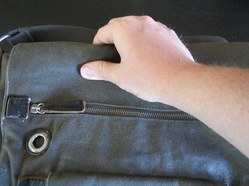 how to wax gear rubbing spreading wax across the fabric surface