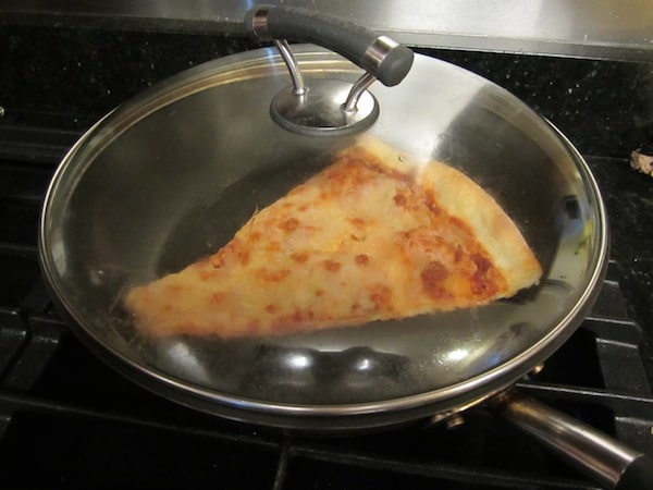 reheating pizza on a skillet stove 