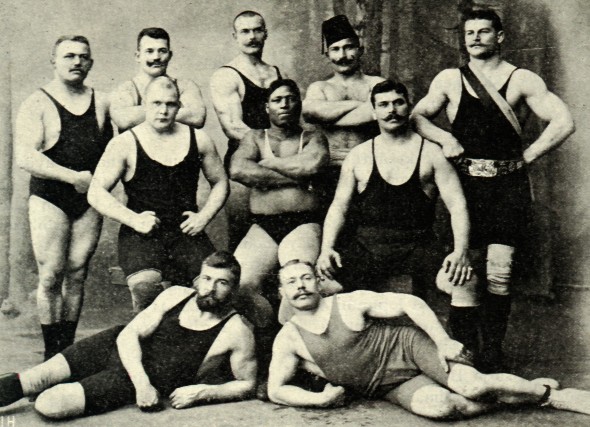 vintage weightlifters strongmen posing flexing group photo 