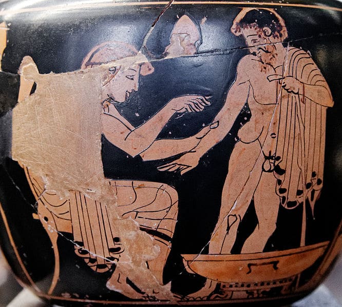 Ancient Greek artwork bloodletting man giving blood.