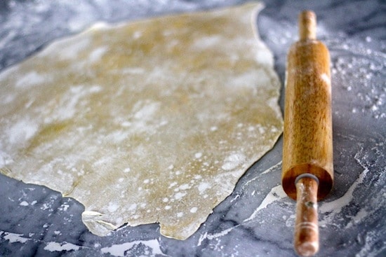 rolling fresh dough pasta noodles rolling pin