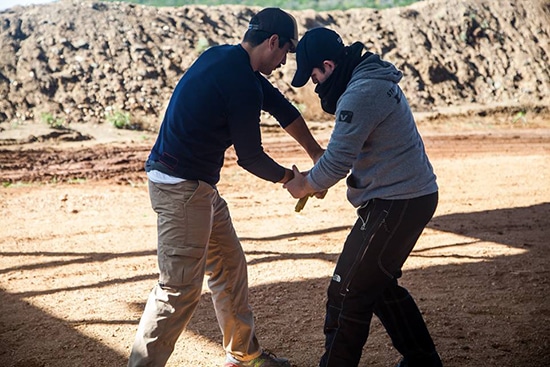self defense disarming an attacker with gun drawn