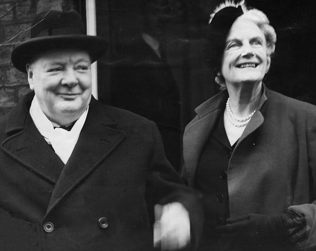 Winston and clementine Churchill outside smiling.