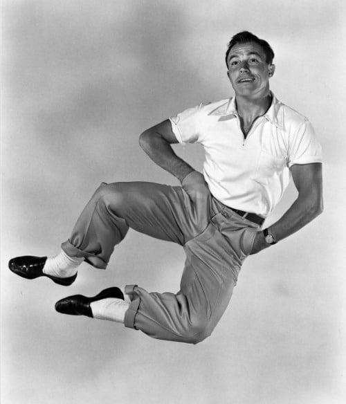 vintage happy go lucky man jumping clicking heels