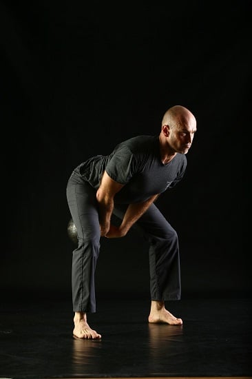 kettlebell swing swinging weight through legs