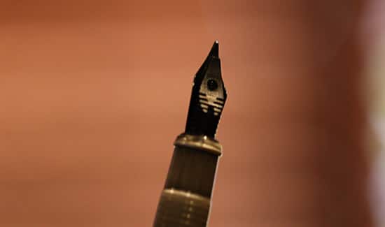 fountain pen feed hugging bottom of nib close up photo