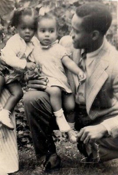 Vintage african-american father with daughters.