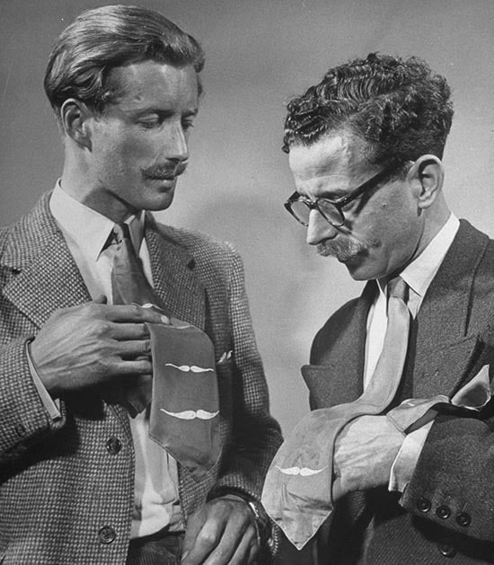 Vintage men comparing ties mustache neckties.