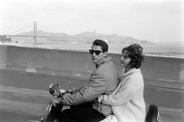 Vintage 1950s couple scooter golden gate bridge.