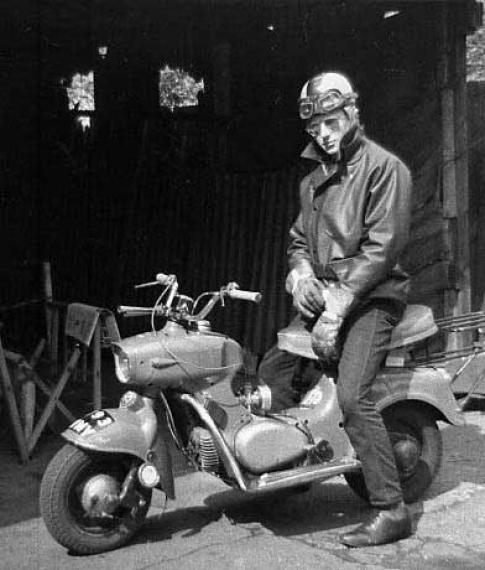 Vintage man scooter.