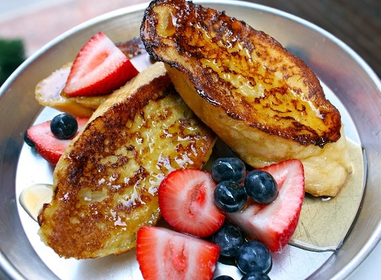 Perfect french toast with real french bread and fresh berries.