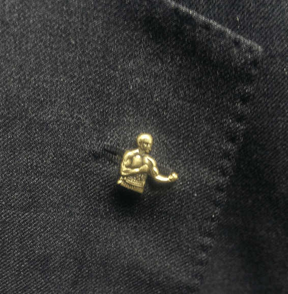 Lapel pin groomsmen gift - john sullivan art of manliness.