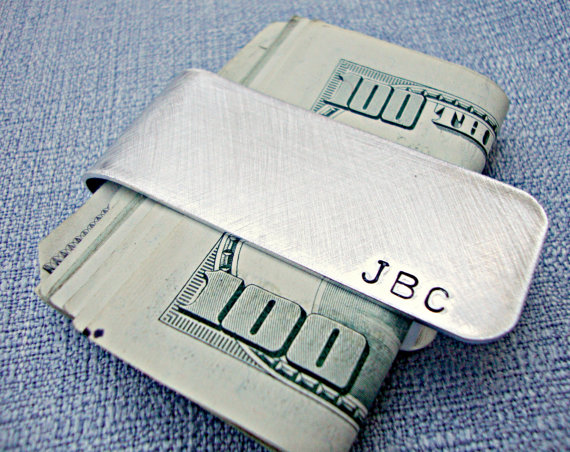 Customised monogrammed silver money clip.