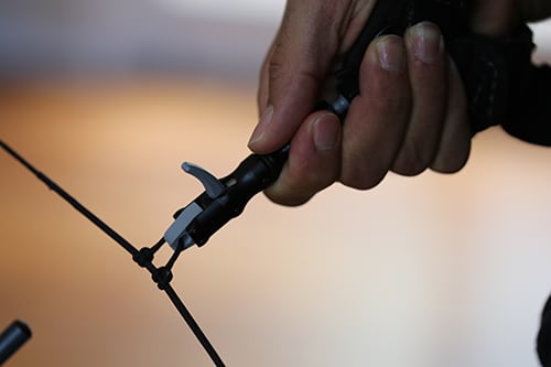 compound bow mechanical release attached to d loop