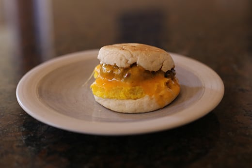 warmed microwaved homemade breakfast sandwich sausage egg cheese