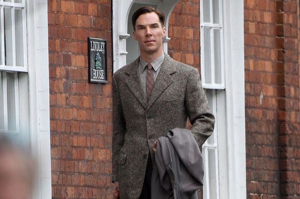 Benedict cumberbatch walking with textured suit.