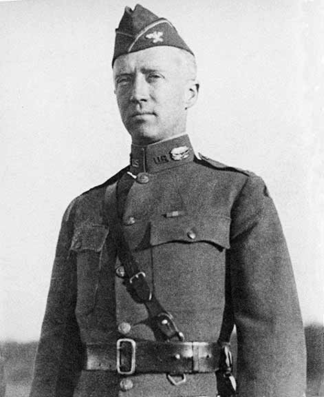 George S. Patton in military uniform sten look on face.