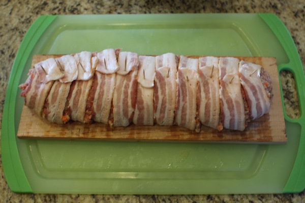 Wrap the loaf, and secure the bacon in a tray.