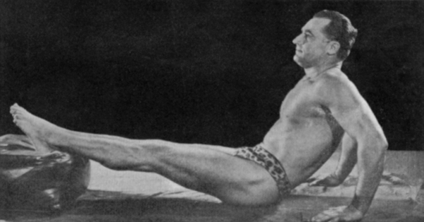 Vintage Charles Atlas doing exercise.