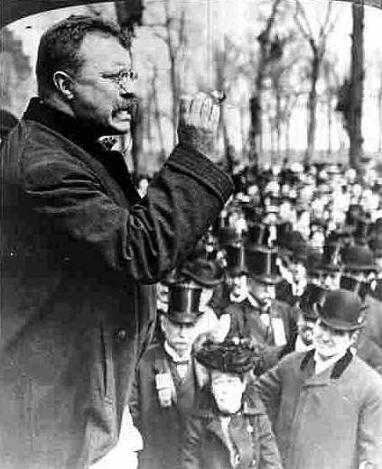 Vintage Theodore Roosevelt giving speech to people.