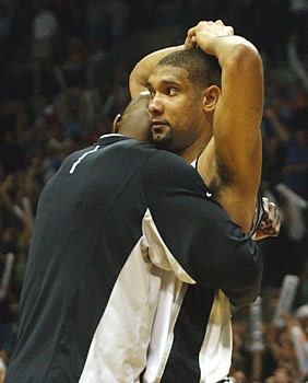 Tim Duncan NBA being hugged in a match.