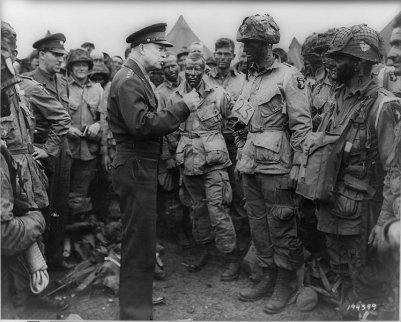 Dwight D Eisenhower giving instructions to soldiers in battle.