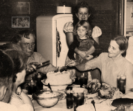 Vintage family eating dinner.