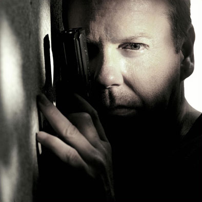 Jack Bauer giving a pose with carrying pistol.