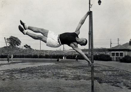 Vintage man gymnast at outside.