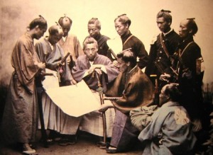 A group of Samurai standing around a map, discussing the Bushido Code and Eight Virtues.