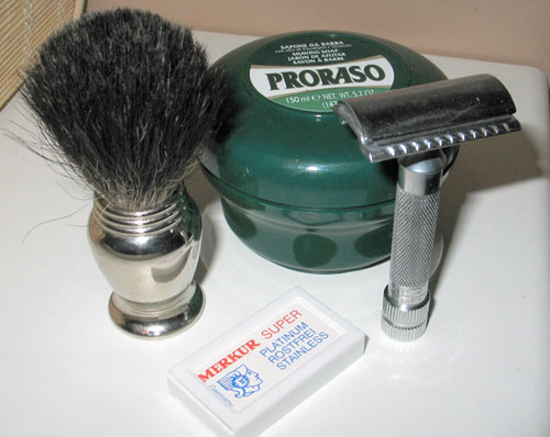 Shaving kit brush safety razor blades.