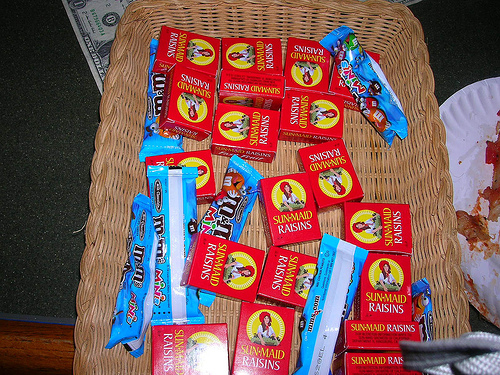 Halloween basket of raisins and chocolates. 