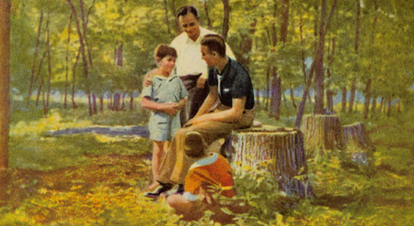 Father with sons in woods outdoors painting.