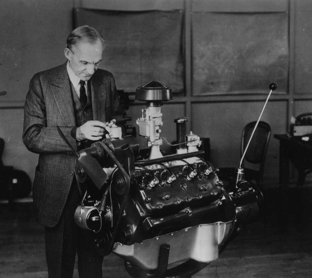 Vintage Henry Ford working with V8 Engine.