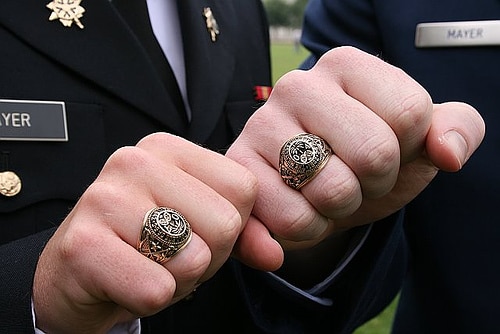 Cadets wearing gold ring in finger.