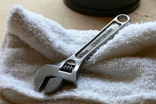 Craftsman wrench placed on towel. 