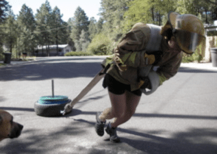 Homemade man pulling sled for fitness.