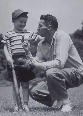 Vintage father dad and son playing catch with baseball.