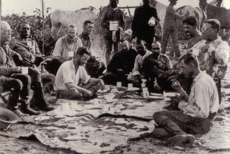 Group of Brazilian wilderness sitting and having a tea.