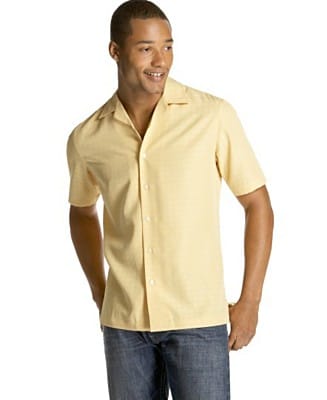 Black American wearing polo button down short sleeve shirt.