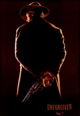 Unforgiven movie poster actor holding gun.