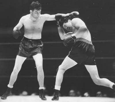 James Braddock dodging punch while boxing.