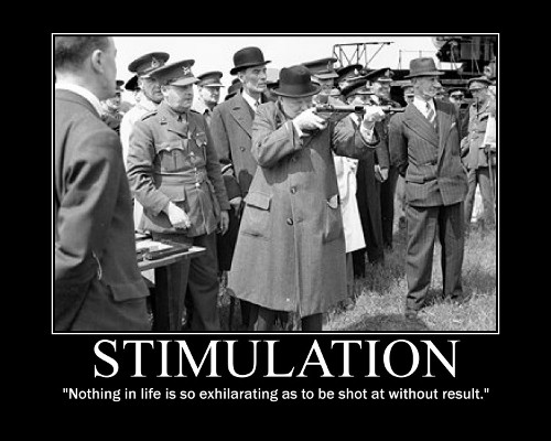 Winston Churchill firing the gun in front of crowd.