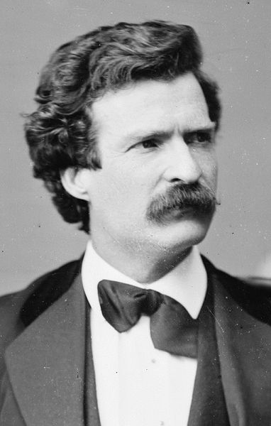 Mark Twain's portrait showing mustache in tuxedo.