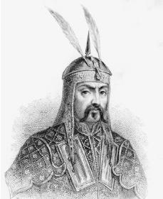 Genghis Khan in his suit posing showing mustache.