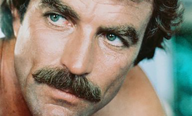 In the history of facial hair, few can compare to the man with one of the all-time manliest mustaches. His piercing blue eyes only add to his rugged charm.