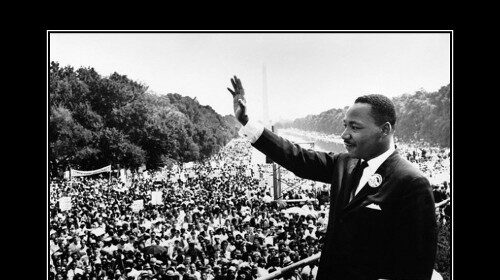 A motivational photo of Martin Luther King Jr waving to the crowd, specially curated for the Black History Month Edition.