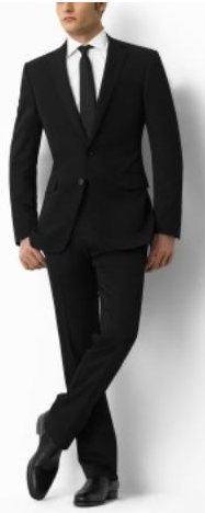 Man giving pose in black suit.